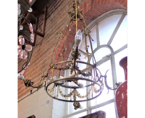A LOUIS XVI STYLE GILT-METAL CEILING LIGHT 20th century, the scrolling branches with rosette drip pans, 88cm high x 74cm wide