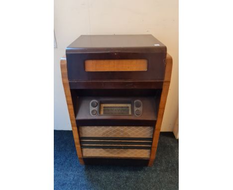 *An Art Deco style walnut cased Garrard model RC75A radiogram with lift up top turn table