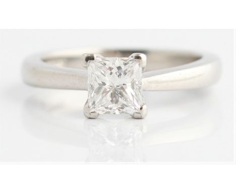 A hallmarked platinum diamond solitaire ring, set with a princess cut diamond, measuring approx. 1.02ct (stone has been unset