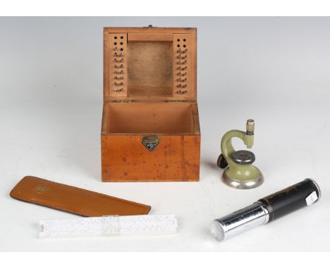 A collection of watchmaker's tools and scientific instruments, including a Star staking tool set, boxed, and an Otis King's p