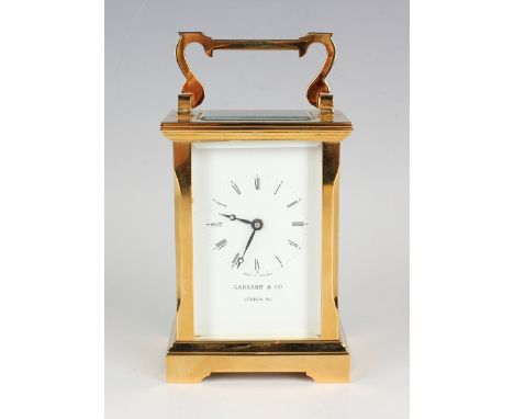 A late 20th century lacquered brass cased carriage timepiece with eight day jewelled movement, the dial with black Roman hour