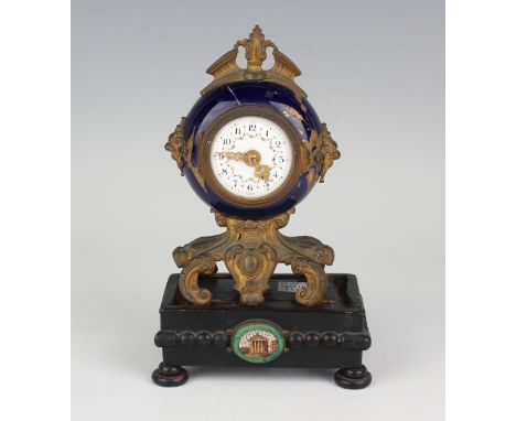 A late 19th century French gilt metal and blue glazed porcelain mantel timepiece with platform escapement, the circular ename