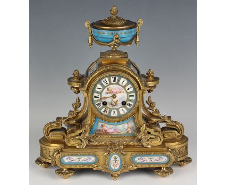 A late 19th century French ormolu and Sèvres style porcelain mantel clock with eight day movement striking on a bell, the cir