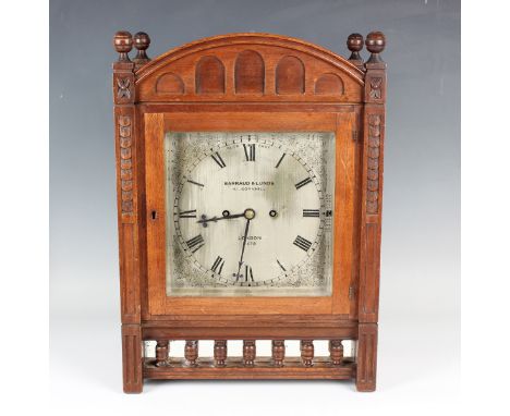 A late Victorian walnut bracket clock with eight day twin fusee movement striking hours and half hours on a gong, the backpla