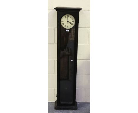 A George V ebonized electric master clock case with 7-inch painted circular dial and part of mechanism, the case with moulded