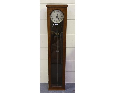 A George V electric master clock, the 7-inch silvered circular dial with black Roman hour numerals and inscribed 'Gillett &am