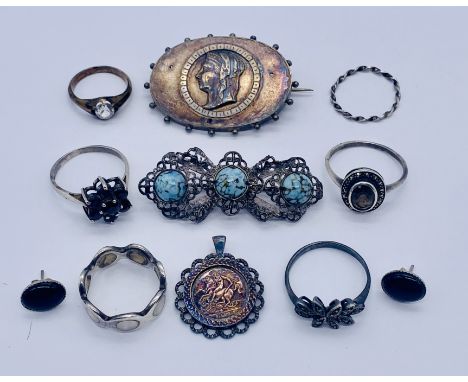 A small collection of silver jewellery including brooches, rings etc.