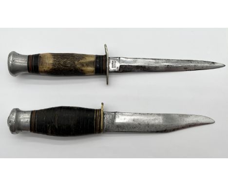 A William Rodgers fighting knife with antler handle along with another Fairburn Sykes style dagger with indistinct maker's na