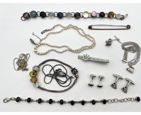 A small collection of costume jewellery including silver etc