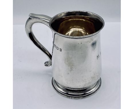A hallmarked silver tankard, weight 210.8g