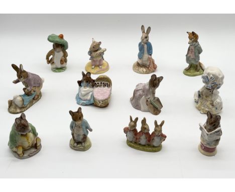 A collection of twelve Beswick Beatrix Potter figures including Peter and the Red Pocket Handkerchief, Johnny Town Mouse Eati