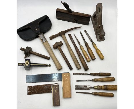 A collection of vintage and antique tools including Sorby chisels, woodworking plane by W Greenslade of Bristol stamped "Exhi