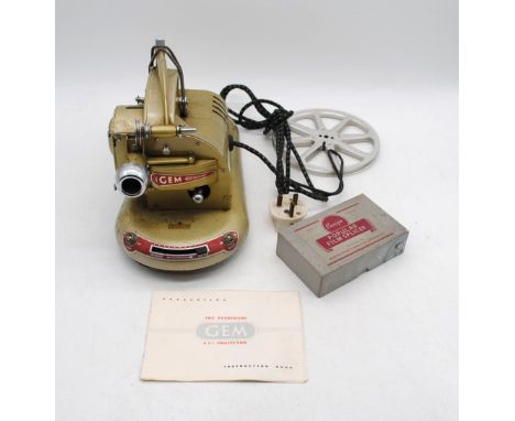 A Gem 9.5mm film Pathescope projector, with instructions, a boxed Ensign film splicer and parts etc.