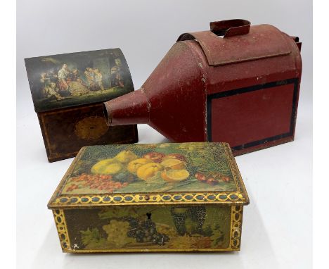 A vintage painted tin smoker and two vintage tins, one being in the shape of a tea caddy.