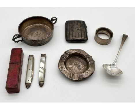 A collection of hallmarked silver items including porringer, ladle, cigarette case, ashtray and cased set of Georgian knife a