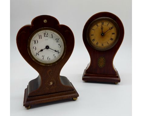 A Victorian balloon shaped inlaid mantle clock, and another.