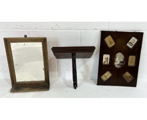 A collection of items including a pine framed mirror, Victorian photo frame and mahogany wall bracket