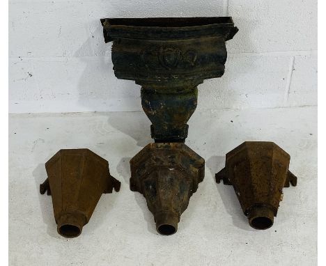 A large cast iron hopper (A/F), along with three smaller ones