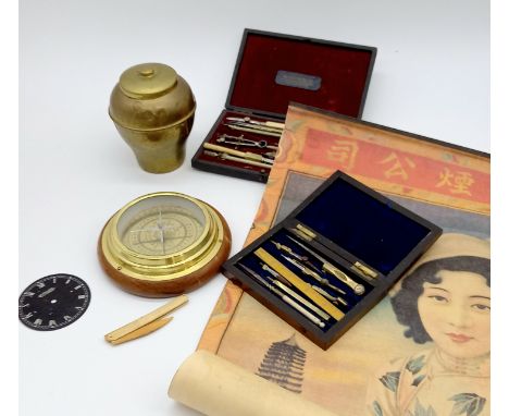 A collection of miscellaneous items to include Lipton's brass tea caddy, Jaeger clock face, compass etc.