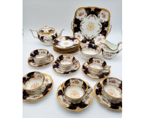 A Coalport Batwing Colbalt blue V. 2665 pattern tea set comprising teapot, milk jug, sugar basin six cups, saucers, tea plate