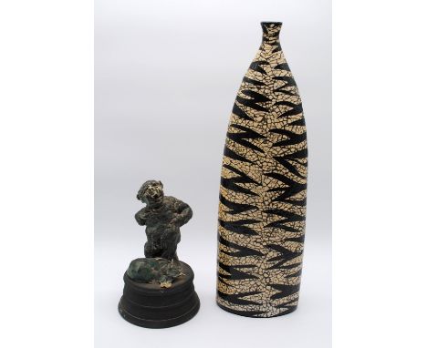 A ceramic figure of a farmer and a calf by Ian Gregory, with marks to reverse, along with a large ceramic vase