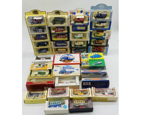 A collection of boxed die-cast vehicles including Lledo Days Gone, Vanguards Gilbow Exclusive First Editions, Corgi Golden Ol