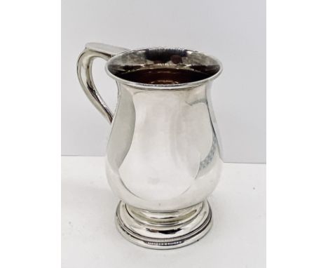 A hallmarked silver tankard, weight 164.7g