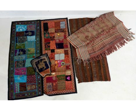 A collection of assorted Indian patchwork panels, oriental panel embroidered with a dragon and a Aztec design wrap.  