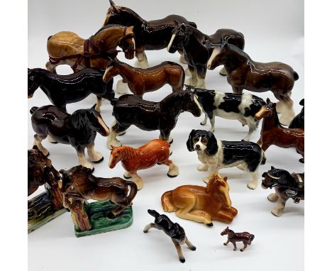 A collection of various ceramic horses to include a cooper craft king Charles spaniel etc