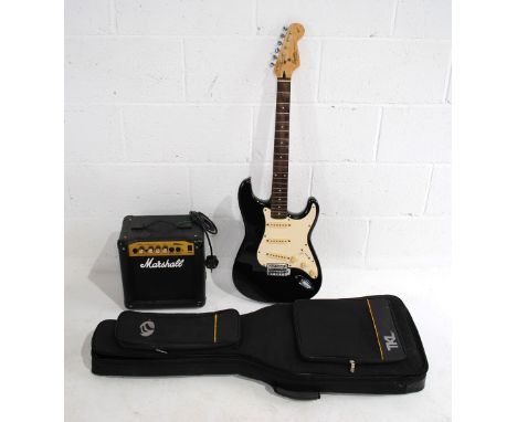 A Fender Squire 50th anniversary Stratocaster electric guitar, with a TKL soft case and a Marshall MG Series 10CD amplifier -