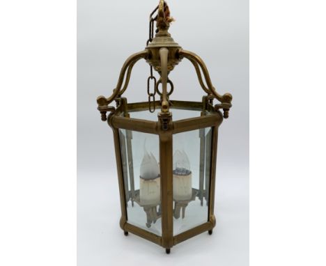 A vintage octagonal bevelled brass and glass lantern - height 50cm