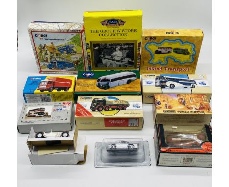A small collection of boxed Corgi die-cast coaches and trucks, along with boxed Matchbox Model of Yesteryear Great Beers of t