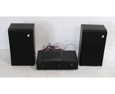A Denon PMA-350SE integrated amplifier, with a pair of Aruko 18LS speakers