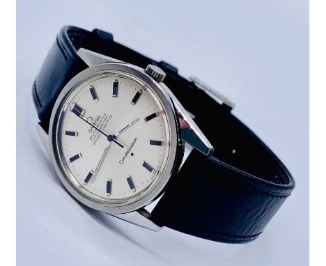 A boxed Omega automatic Constellation chronometer in stainless steel case with baton markers, original Omega leather strap