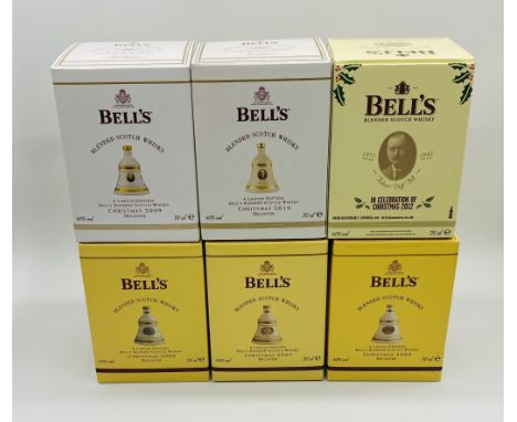 A collection of six boxed limited-edition Bell's Extra Special Old Scotch Whisky Christmas decanters dating from 2006 to 2010