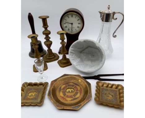 A collection of assorted items to include, silver plated claret jug, hand bell, jelly mould etc.