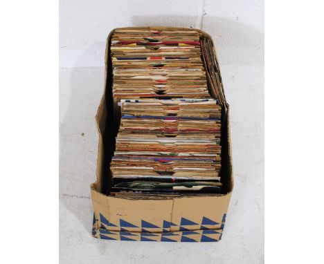 A quantity of various 7" vinyl records, including The Beatles, David Bowie, Jeff Beck, Three Dog Night, Judas Priest, Eurythm
