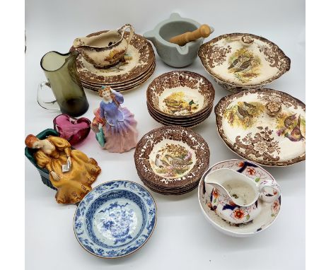 A part Royal Worcester dinner service decorated with game birds, two Royal Doulton figures etc.