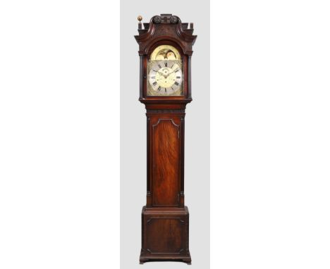 A George III mahogany musical longcase clock, with swan neck pediment above scrolling fretwork frieze and twin columns, the t