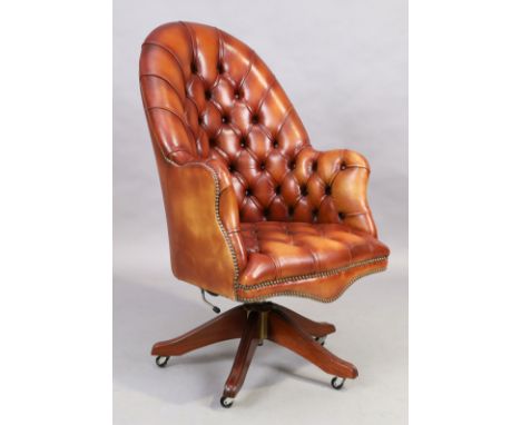 Ring Mekanikk, Norway, a Leather button back desk chair, Victorian style, on splayed mahogany legs and castorsCondition Repor