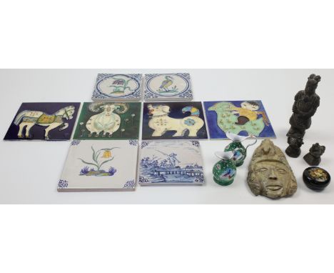 A mixed group of objects of vertu, comprising: a group of glazed tiles with blue and white decoration of flora and wildlife, 