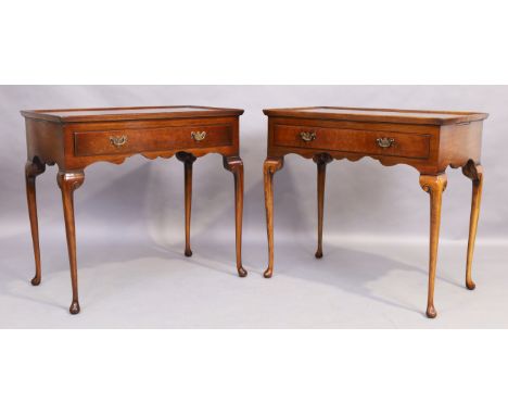 A pair of English walnut side tables, Queen Anne style, 20th century, the galleried tops above single drawer, raised on cabri
