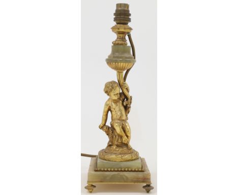 A French ormolu and green onyx table lamp, 19th / 20th century, designed as a cherub supporting a cornucopia tree branch, ato