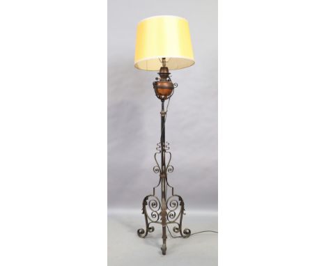 A wrought iron and copper standard lamp, last quarter 19th century, with shade, 184cm highIt is the buyer’s responsibility to
