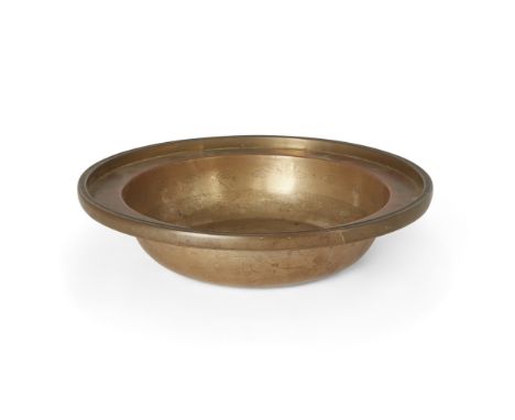 A Chinese bronze 'landscape' basin, Republic period, with a flat base and thick rim, engraved to the central roundel with a p