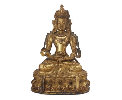 A Sino-Tibetan gilt-bronze figure of Amitayus, Qing dynasty, 18th/19th century, seated in dhyanasana with his hands gathered 