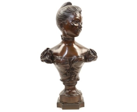 After Jules Félix Coutan, French, 1848-1939, a bronze bust of a French lady, her head turned to sinister, atop a socle base i