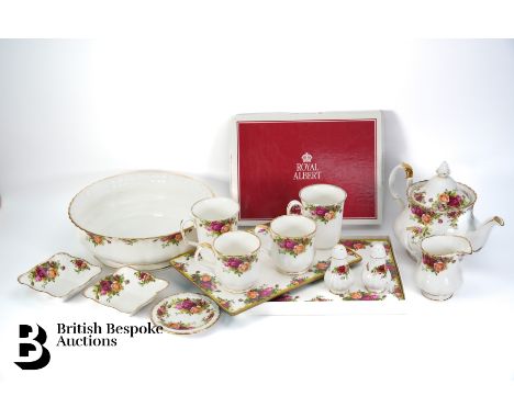 Royal Albert 'Old Country Roses' part dinner service and tea set comprising teapot (af), milk jug, two sugar bowls, seventeen