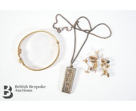 1/59 metal core bangle together with a silver ingot on chain Sheffield hallmark 33 gms, together with a collection of gold me