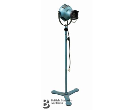 Mid-20th century W J Furse &amp; Co Ltd theatre spot light, finished in green, with a cast iron base marked with the manufact